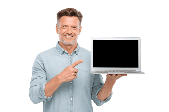 Smiling man presenting a laptop with blank screen.