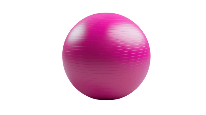 Close up of a pink fitness ball isolated on black. Ideal for yoga, pilates, or physical therapy.