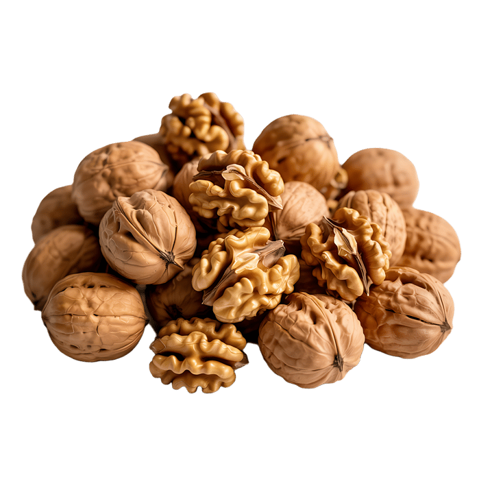 Pile of walnuts, shelled and unshelled.