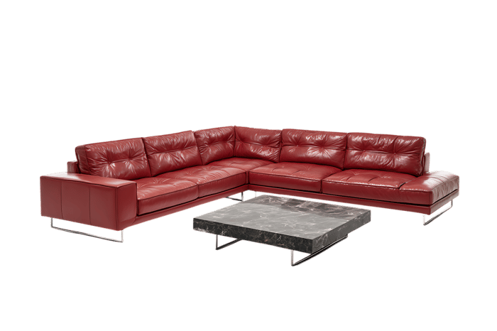 Luxury red leather sectional sofa with coffee table. Modern furniture interior design.