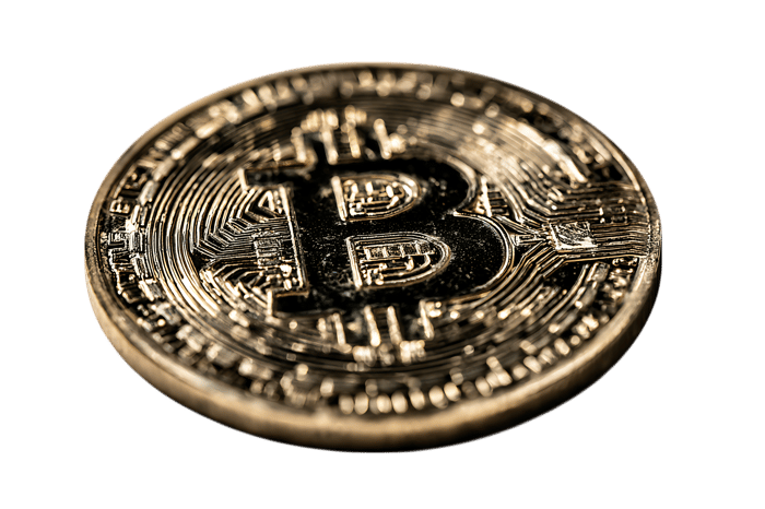 Close up of a gold Bitcoin cryptocurrency coin.