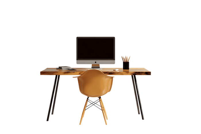 Empty workspace with computer and chair at night
