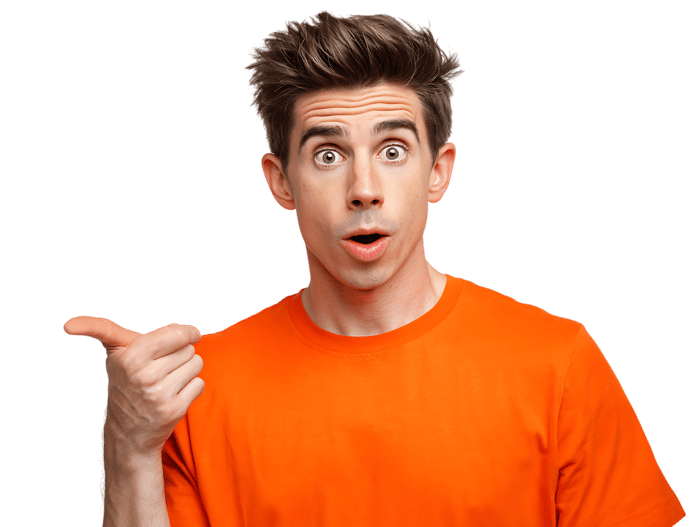 Shocked young man pointing his thumb to copy space. Isolated on black.