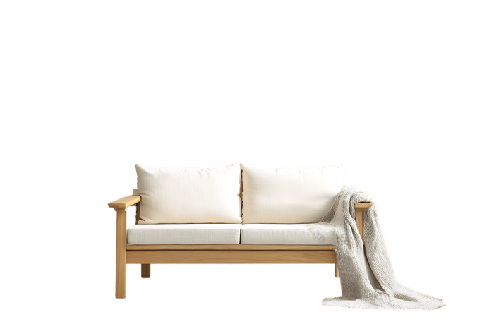 Cozy wooden sofa with white cushions and a soft throw blanket