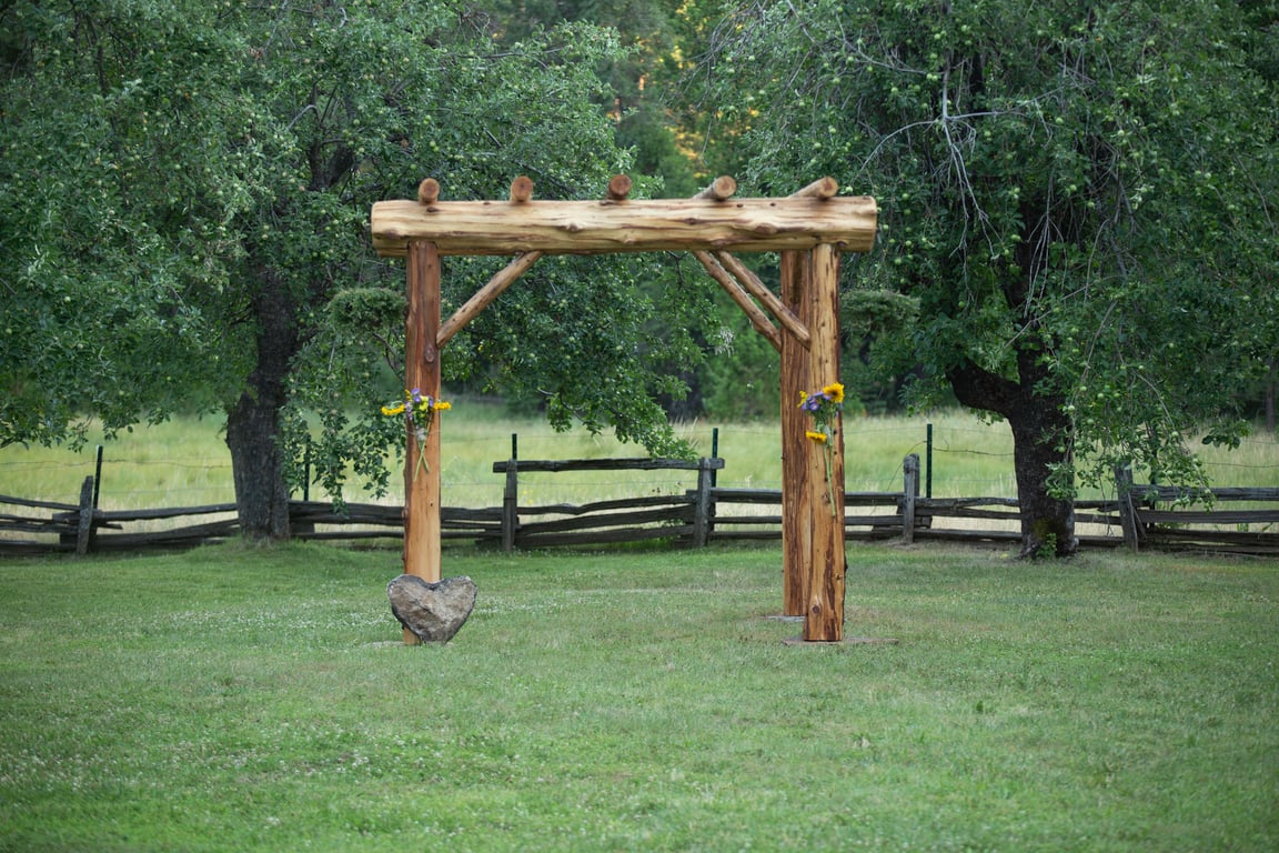Cedar log ceremony arbor at Middle Fork Meadow