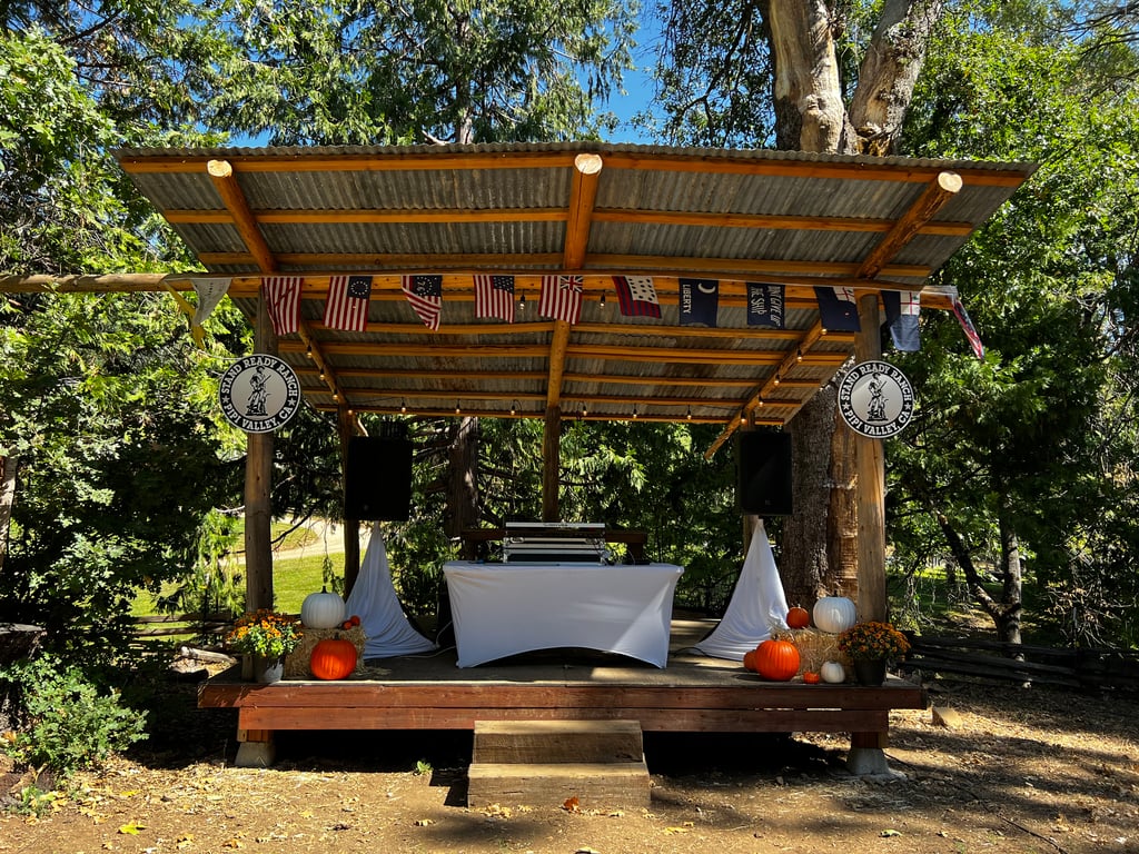 Covered stage for band or DJ