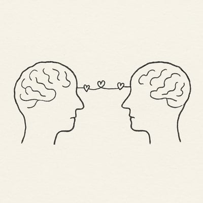 Two outlined brains face each other, linked by a thin thread passing through small hearts, hinting that repeated practice can strengthen empathy pathways.