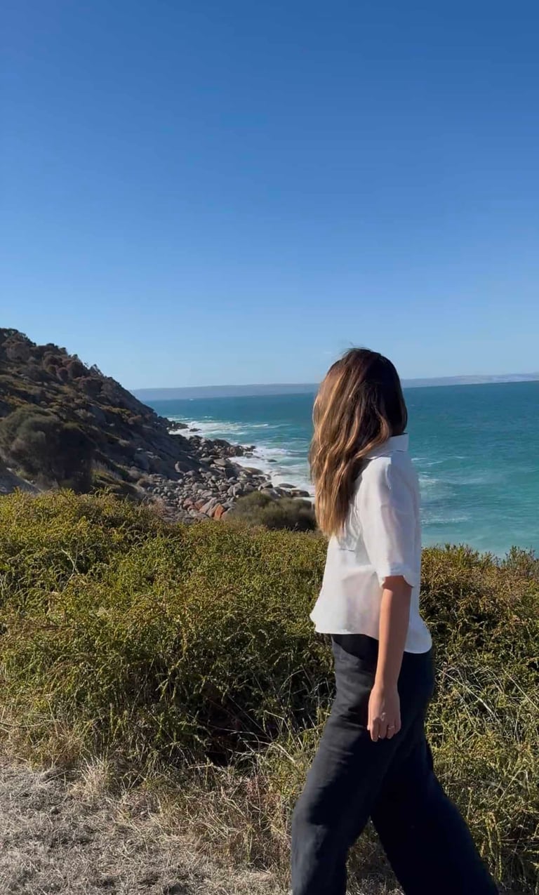 Guest looking at the view from a walk on Sea Dragon Kangaroo Island