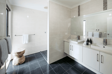 A beautifully designed bathroom at Sea Dragon Lodge on Kangaroo Island, featuring modern fixtures, a spacious shower, and natural lighting. Perfect for guests seeking a luxurious and relaxing experience during their stay.