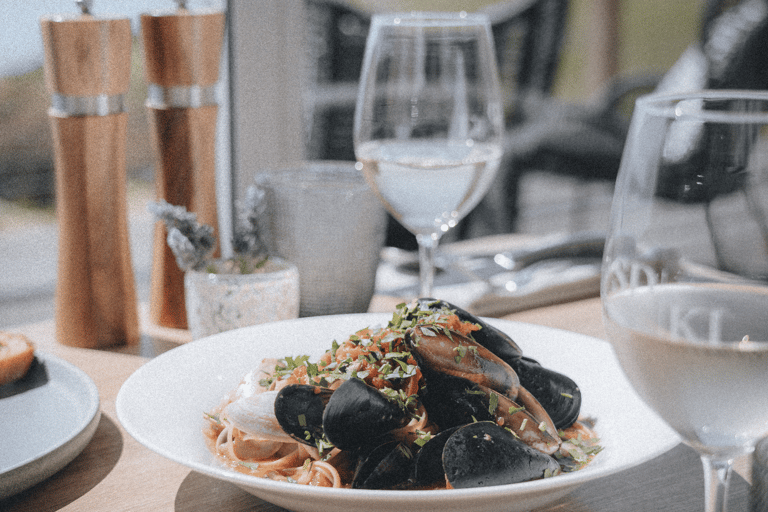 Delicious, locally-sourced gourmet meals at Sea Dragon Lodge on Kangaroo Island, South Australia. Guests can enjoy private, beachfront dining experiences featuring fresh seafood, organic produce, and specialty dishes paired with premium local wines. Perfect for a romantic getaway with immersive nature and wildlife tours.