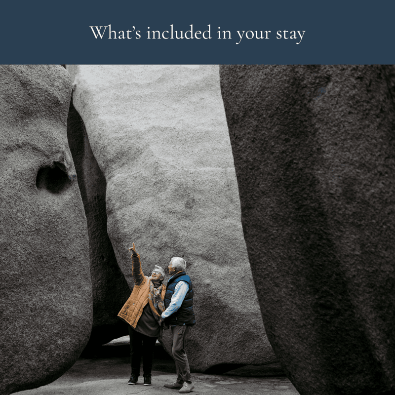 Photo of couple pointing to something at Remarkable Rocks Kangaroo Island