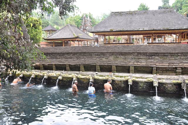 Pilgrims bathing in the holy spring at Tirta Empul
