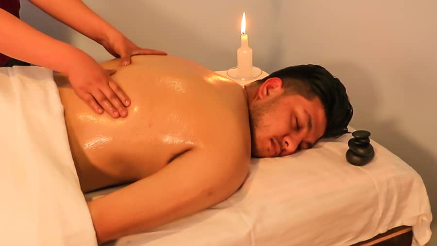 A stack of hot stones on the treatment table