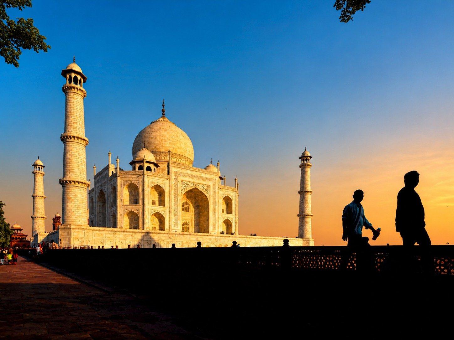 The Taj Mahal at sunset, seen from across the river