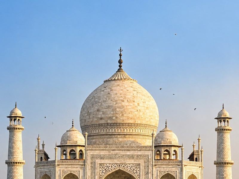 Stand at the Taj Mahal gate before sunrise and watch the marble turn from grey to white.