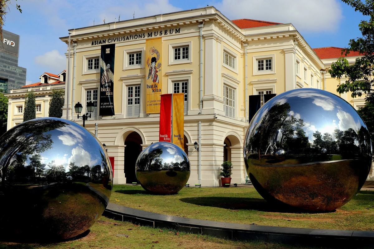 The Asian Civilisations Museum on Empress Place, with mirrored steel spheres on the lawn, Singapore