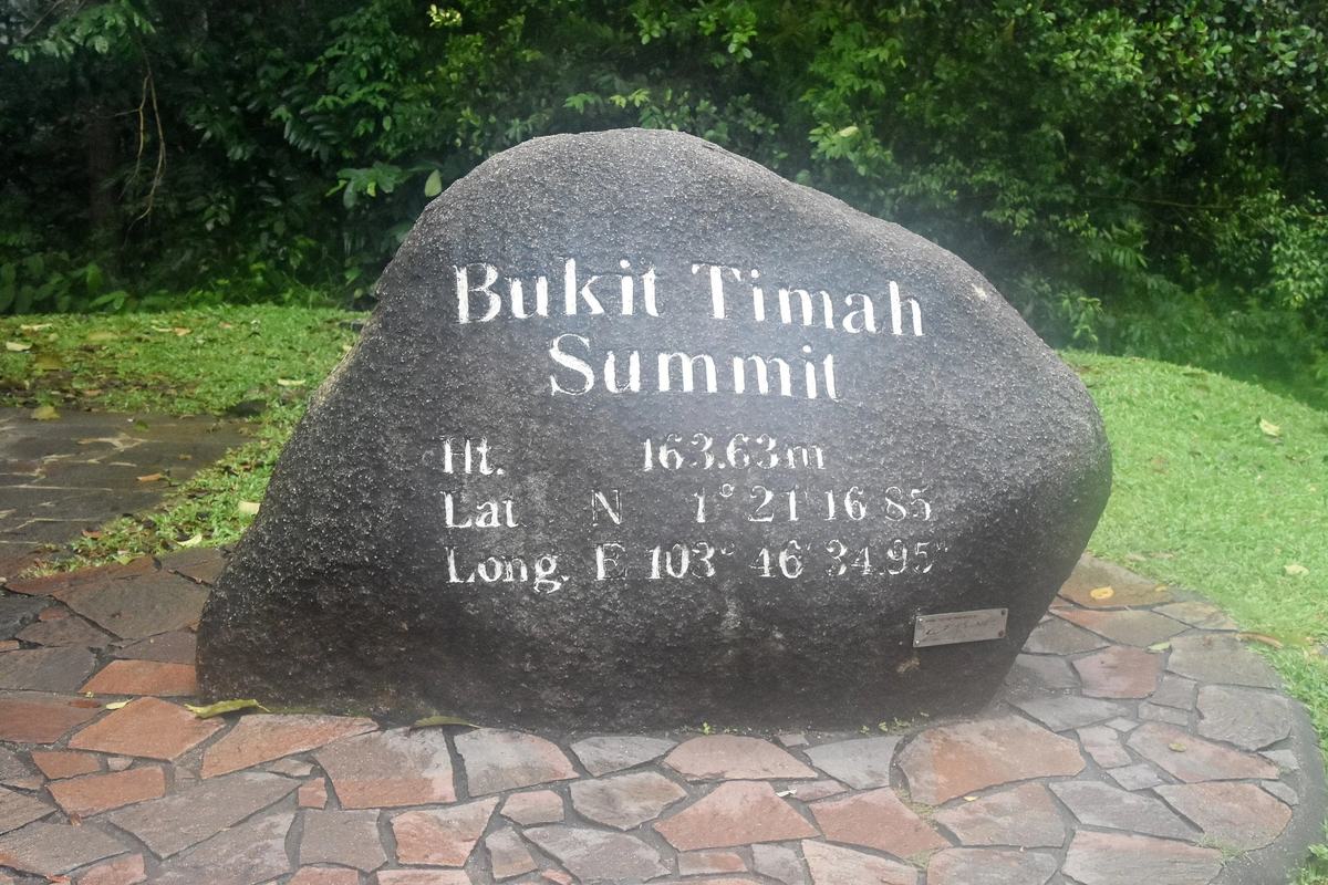 The summit stone on Bukit Timah Hill marking 163.63 metres, Singapore's highest point