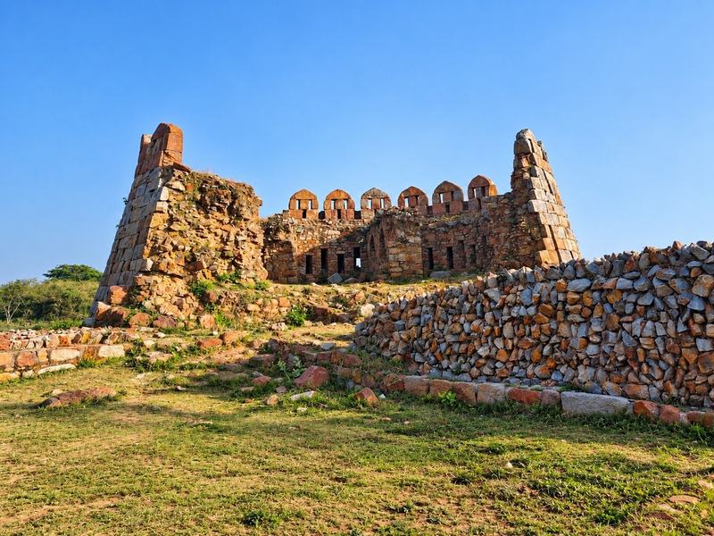 Climb Daulatabad Fort through a dark zigzag tunnel to views across the plain.