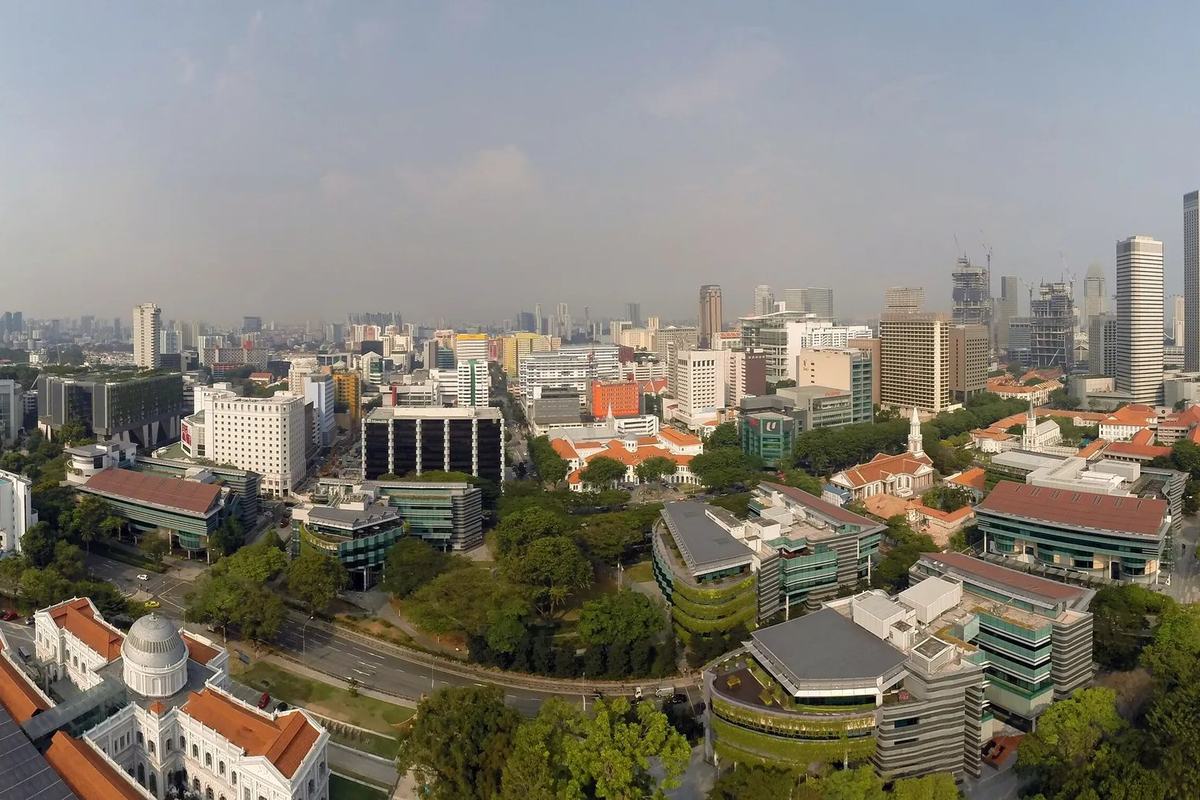 Panorama over the red roofs and towers of central Singapore around Fort Canning