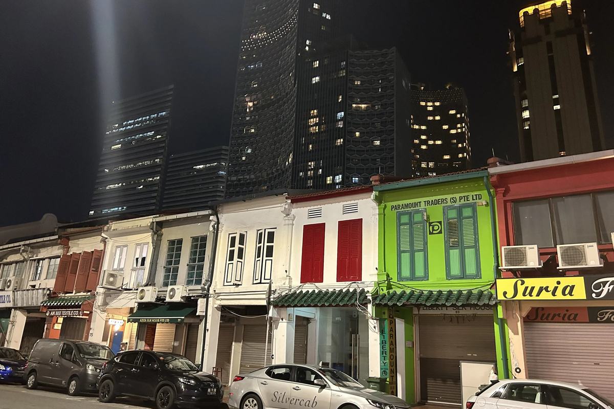 Painted shophouses at night on the edge of Kampong Glam near Haji Lane, Singapore