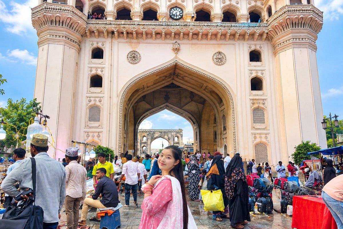 A traveller at the Charminar, Hyderabad, India
