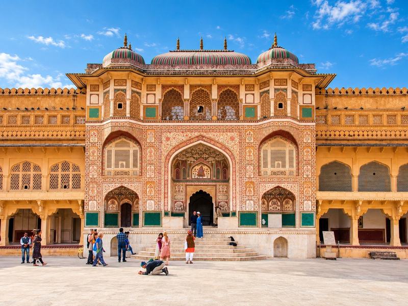Amber Fort's Sheesh Mahal, where thousands of mirrors catch a single flame.