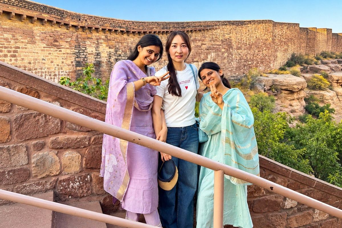 Travellers on the steps at Mehrangarh Fort, Jodhpur, India