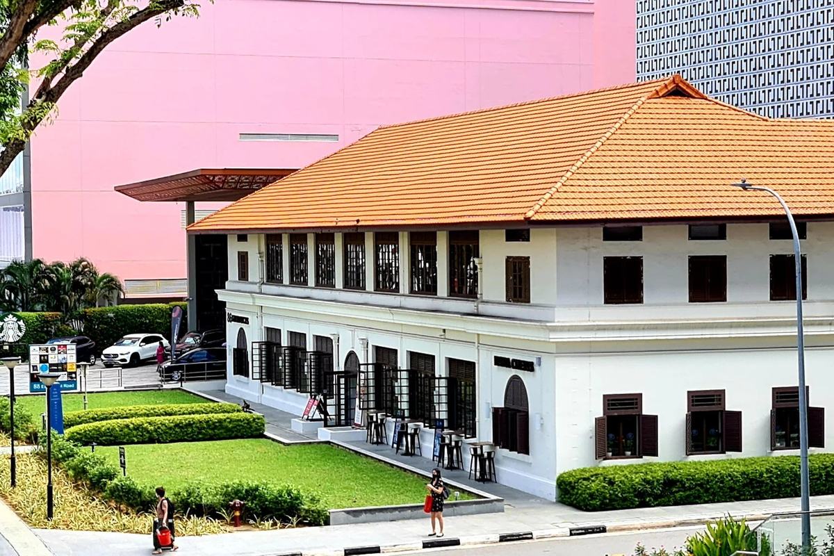 A restored two-storey colonial building with a tiled roof in Katong, Singapore