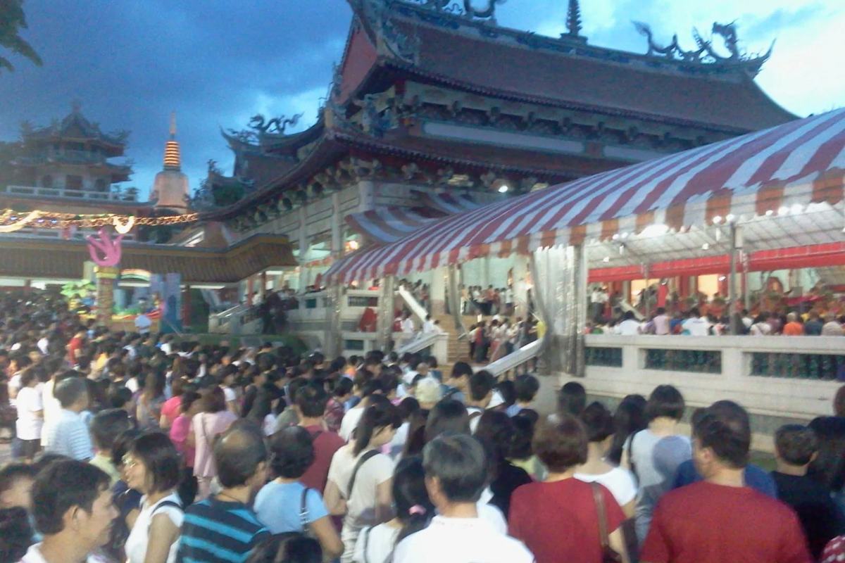 Crowds of devotees on a festival day at Kong Meng San Phor Kark See Monastery, Singapore