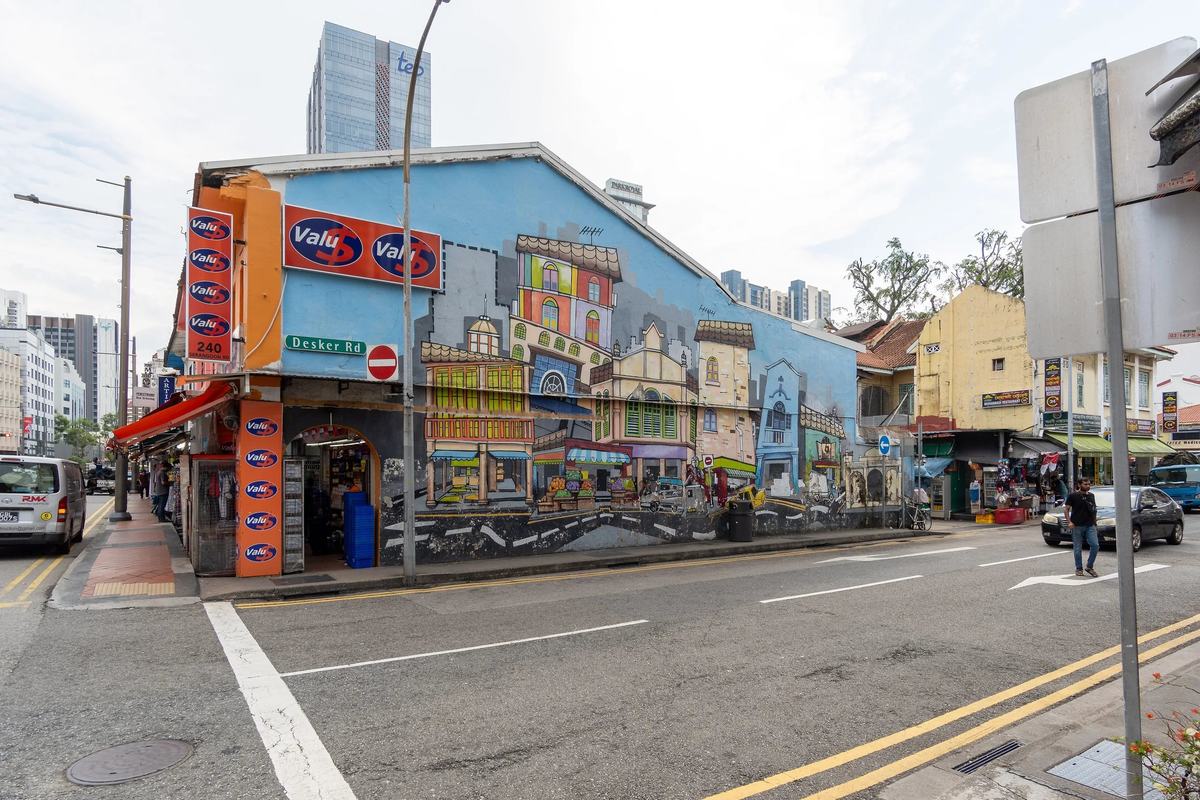 A painted mural on a corner shophouse in Little India, Singapore