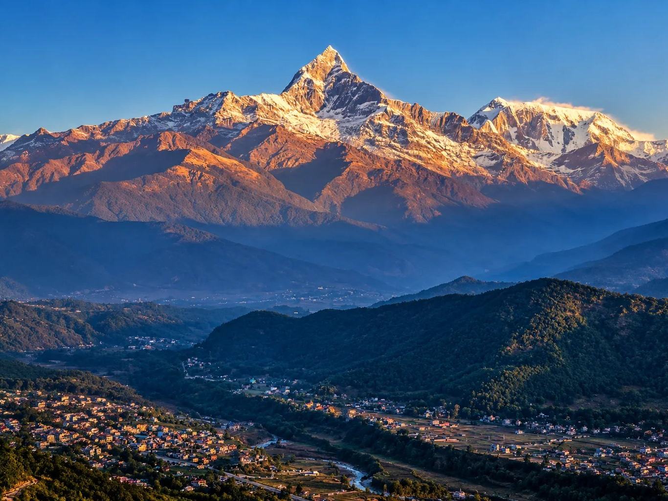 Sunrise on Machhapuchhre and the Annapurna range above the Pokhara valley, Nepal