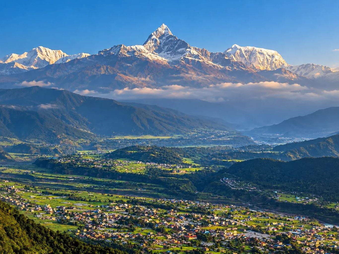 Machhapuchhre and the Annapurna range above the green Pokhara valley, Nepal