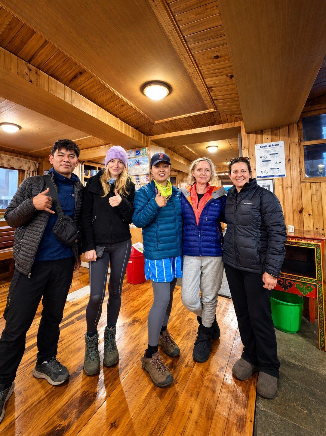 Mingmar Sherpa, Tour Leader, with HSJ trekkers at a lodge in Nepal