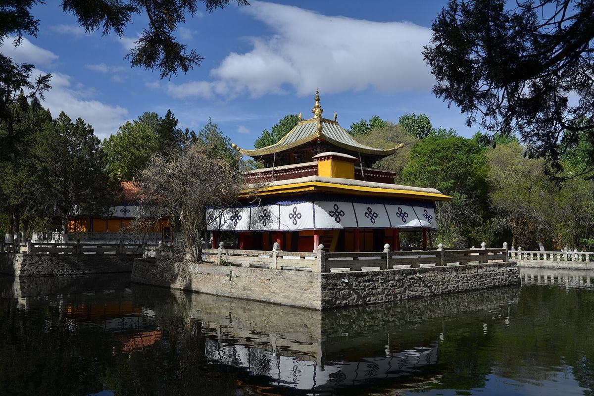 A pavilion beside the lake in the Norbulingka gardens, Lhasa, Tibet