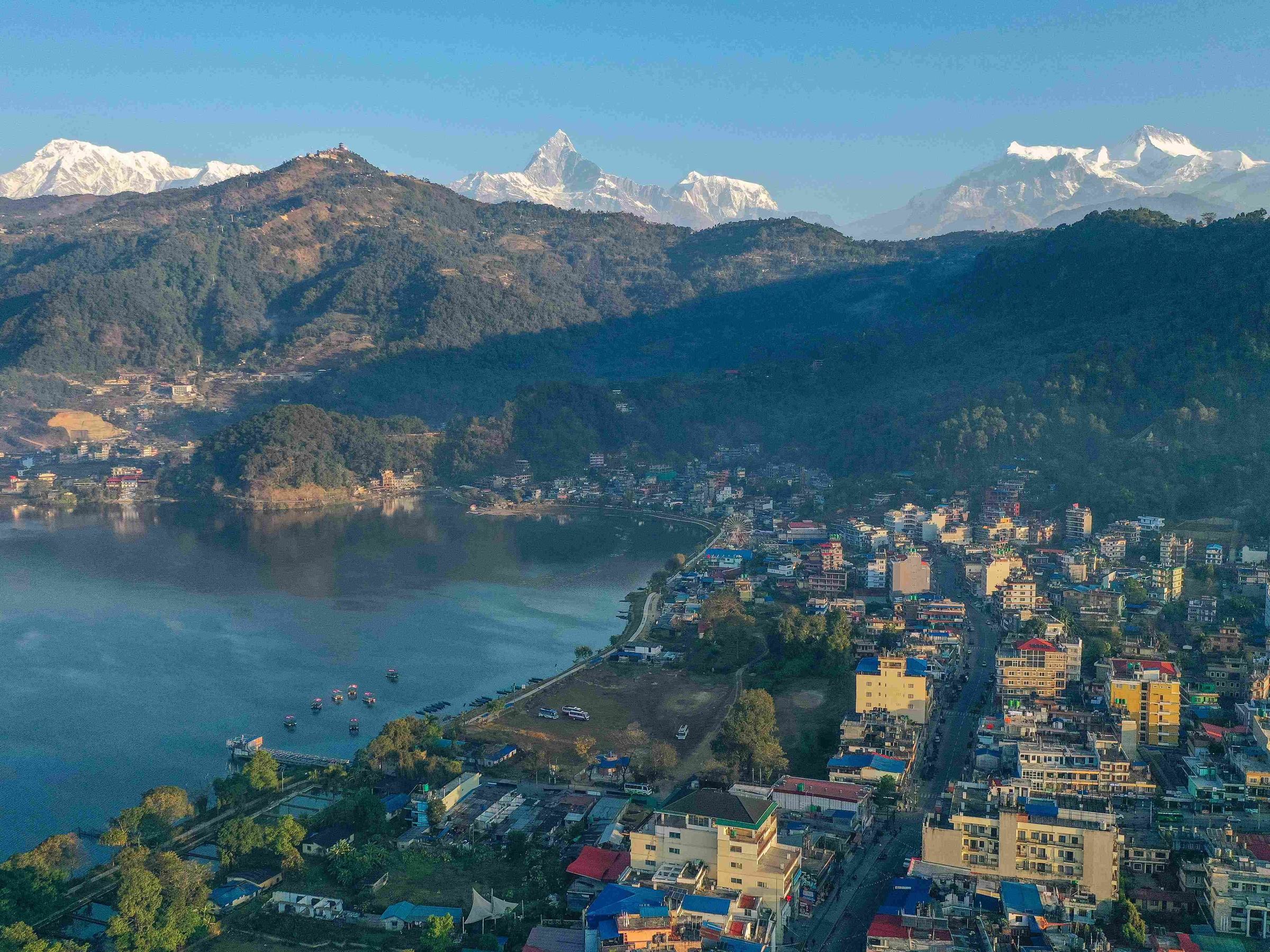 Fly to Pokhara and Evening Excursion