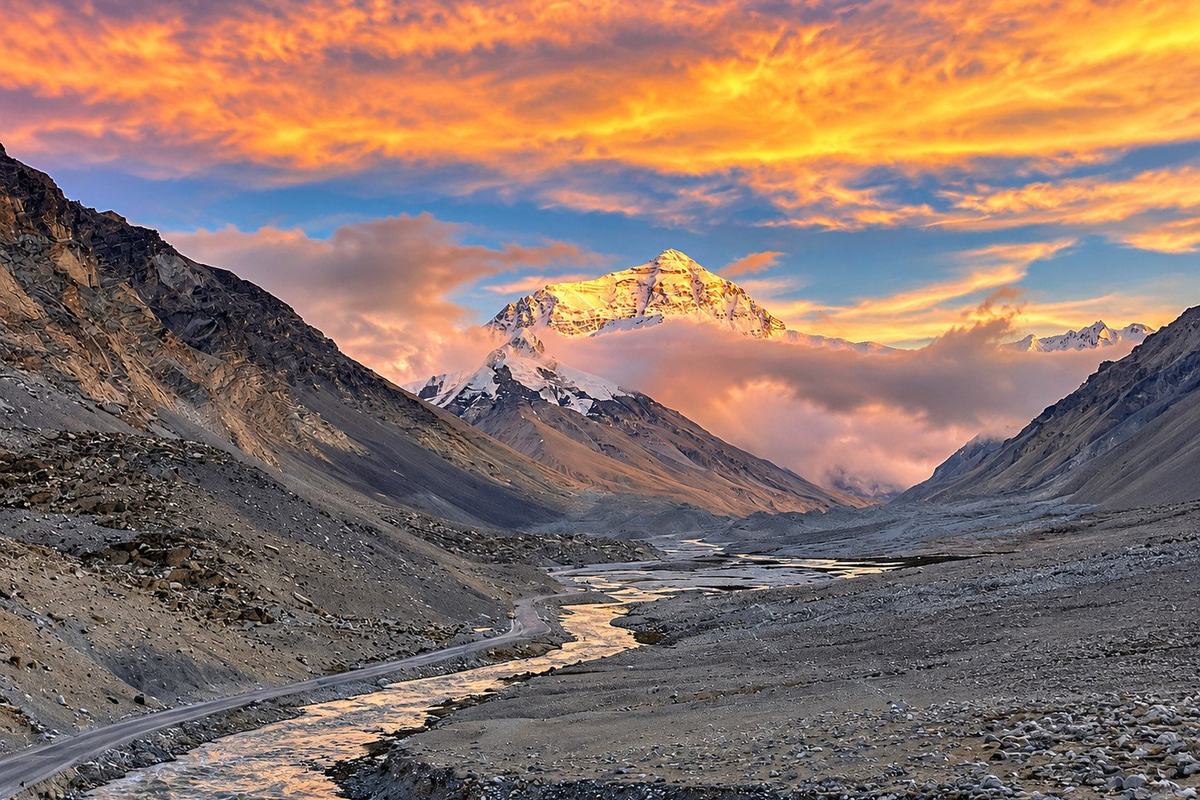 Everest's North Face glowing at sunset above the Rongbuk valley, Tibet
