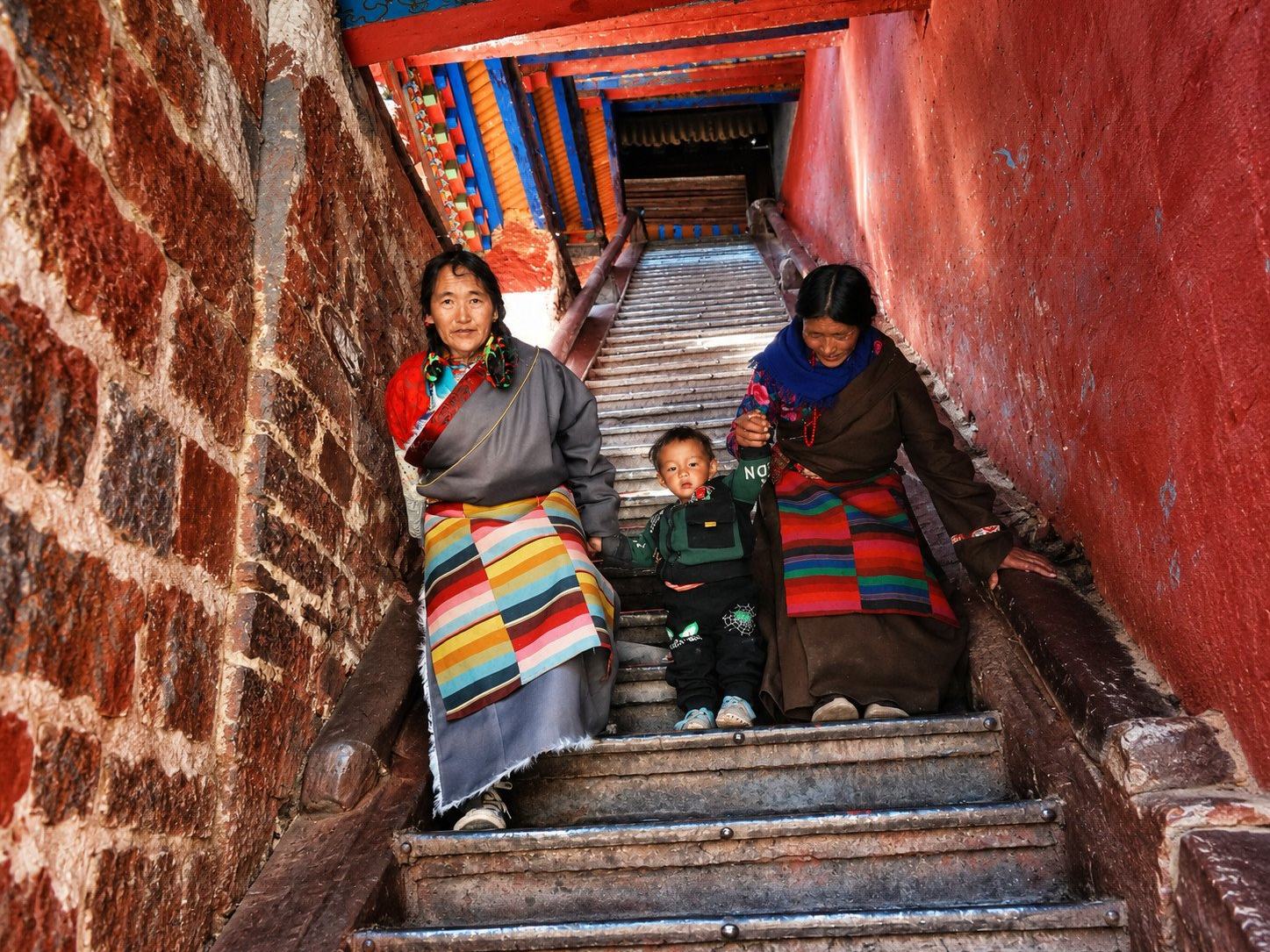 A family on the monastery stairs