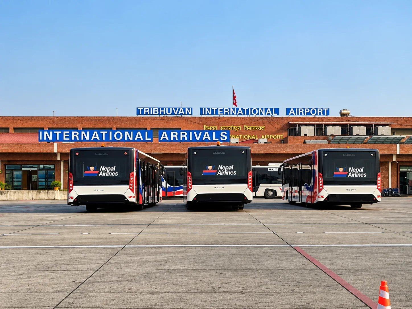 Nepal Airlines buses at International Arrivals, Tribhuvan International Airport, Kathmandu, Nepal
