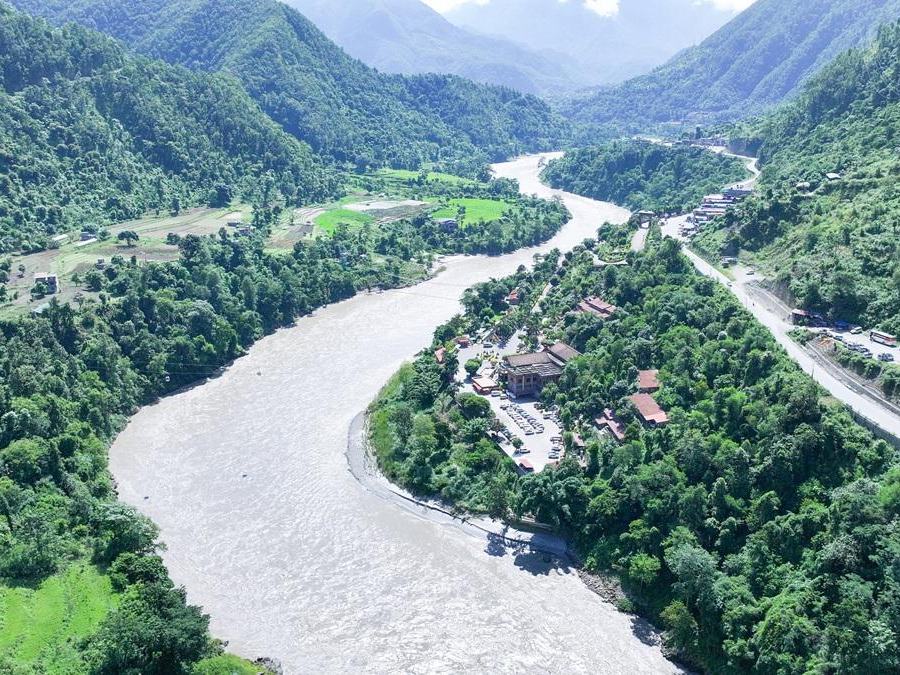 Aerial view of a winding river flowing