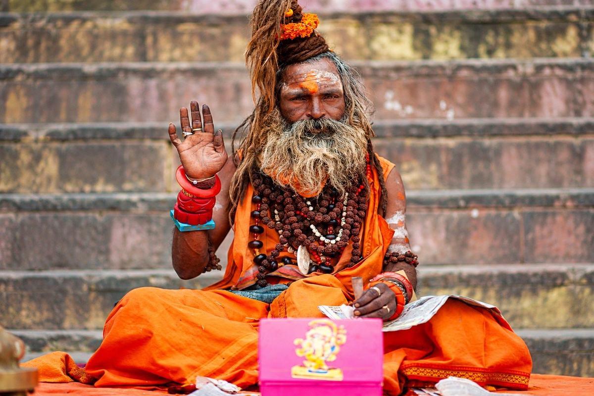 A sadhu on the ghat steps, Varanasi, India