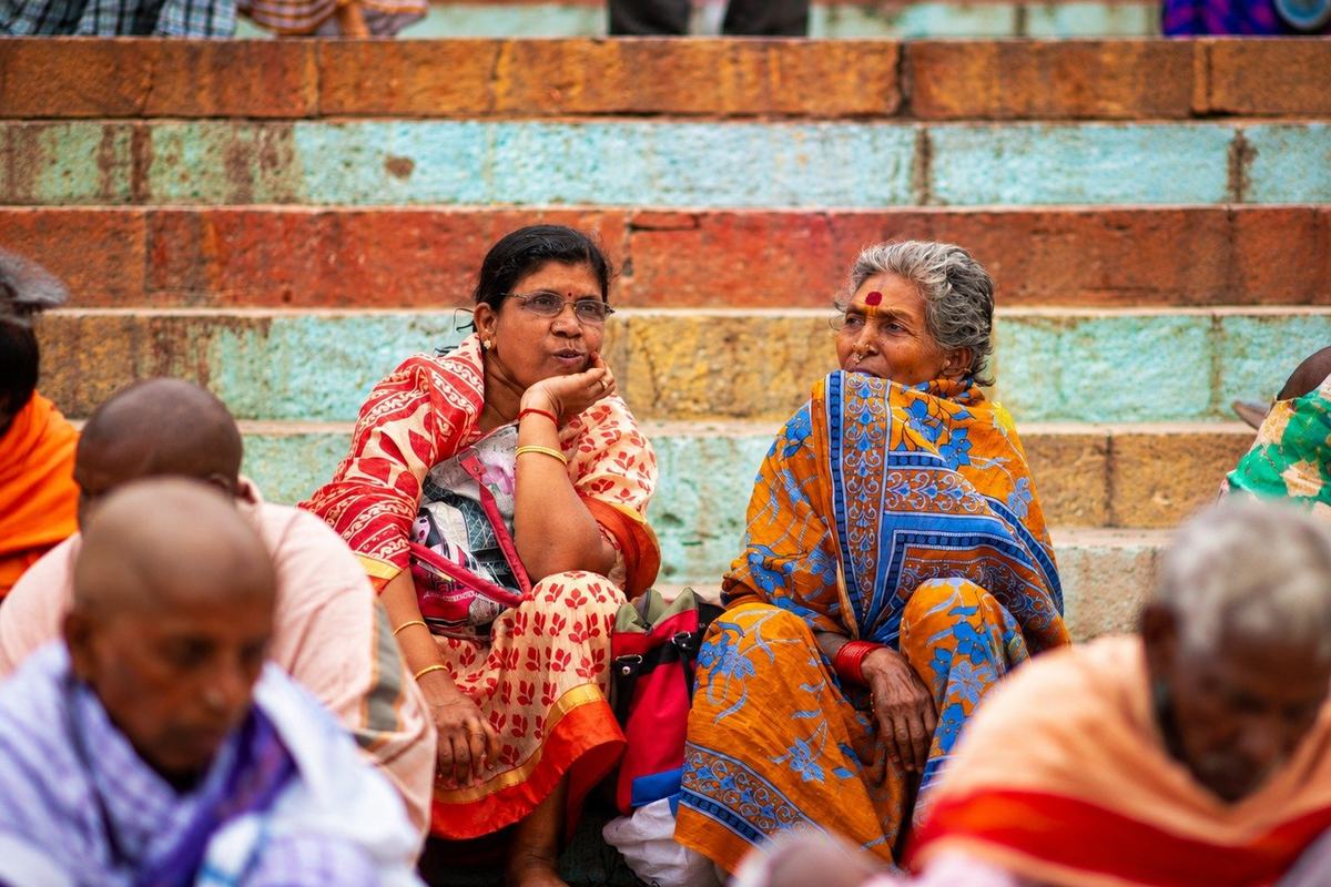 Women sitting on the ghat steps, Varanasi, India