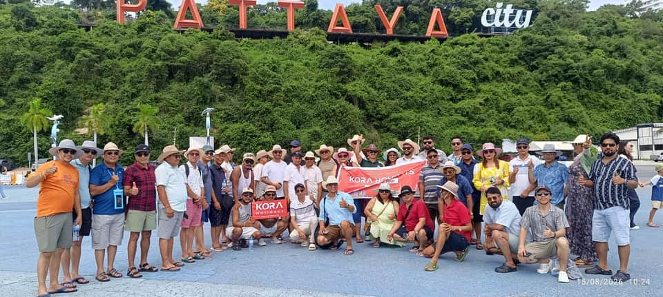 Kora Holidays group tour at the Pattaya City sign, Thailand