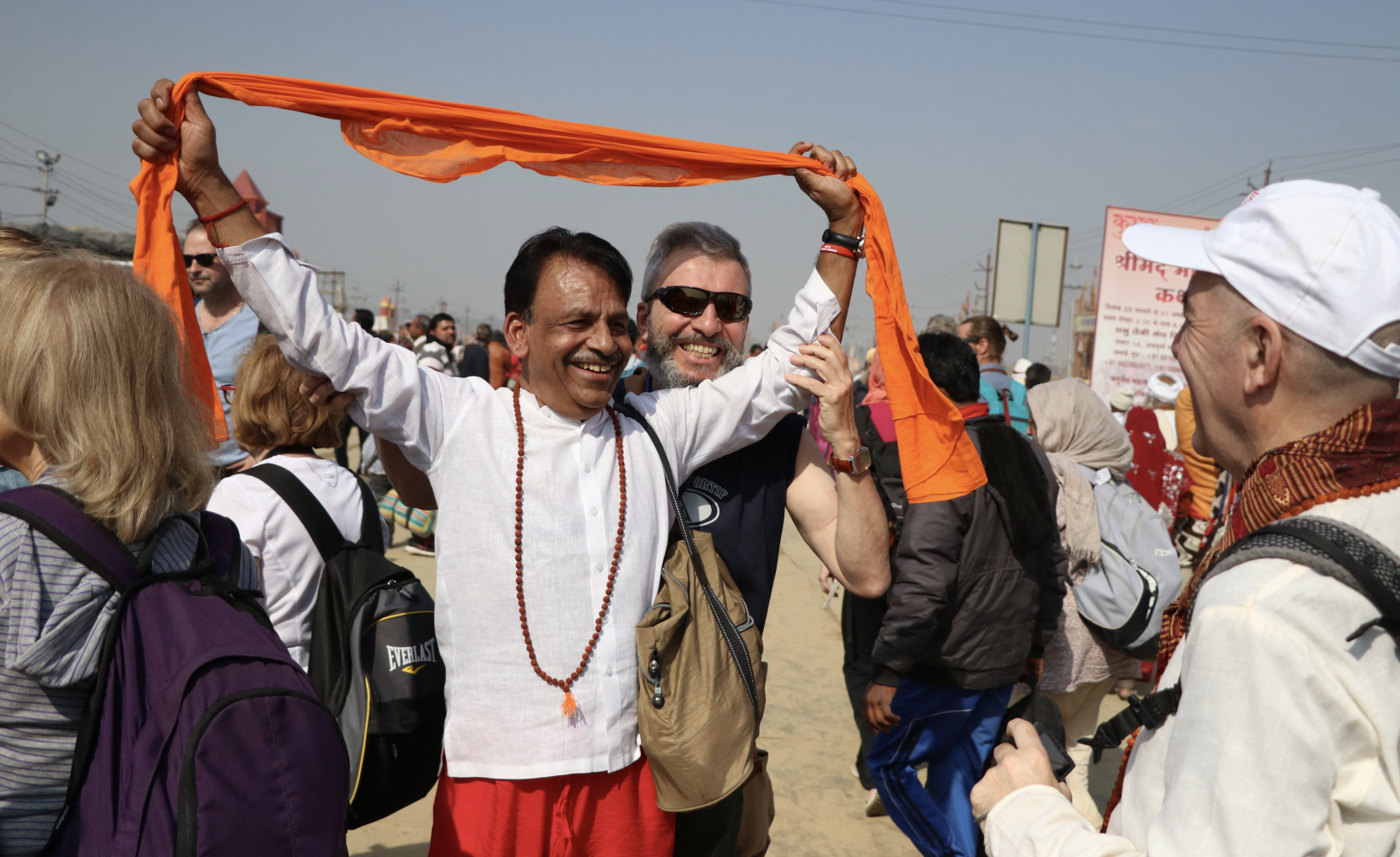 Esteemed guests of Kumbh Sukrit 2019 from Italy, enjoying the Kumbh crowd.
