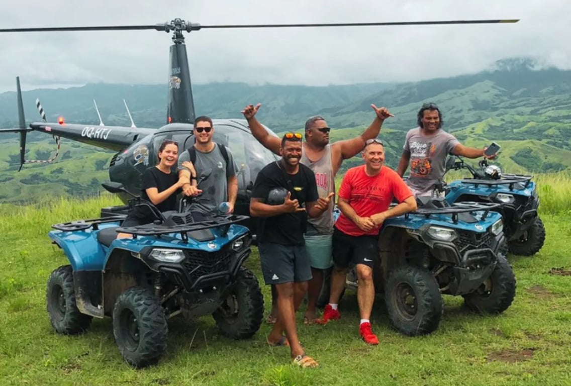 a heli tour and four wheeler tour happy customers