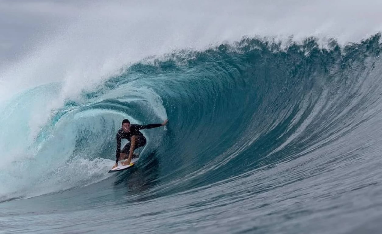 surfing barrels in one of fiji's hotspots