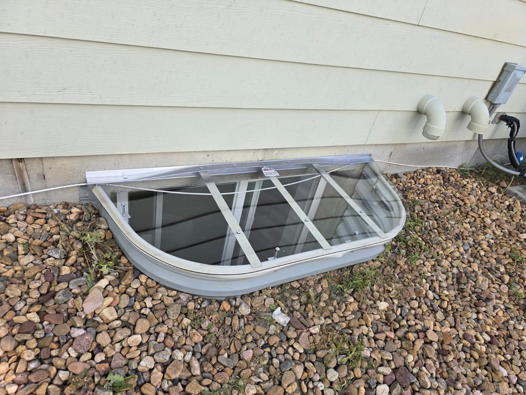Custom window well cover with locks installed near Lowell Indiana