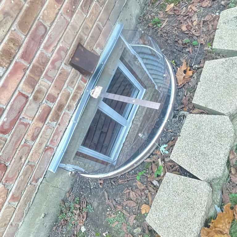 Window well cover with an extension riser installed in Villa Park Illinois for a 40x16 window well