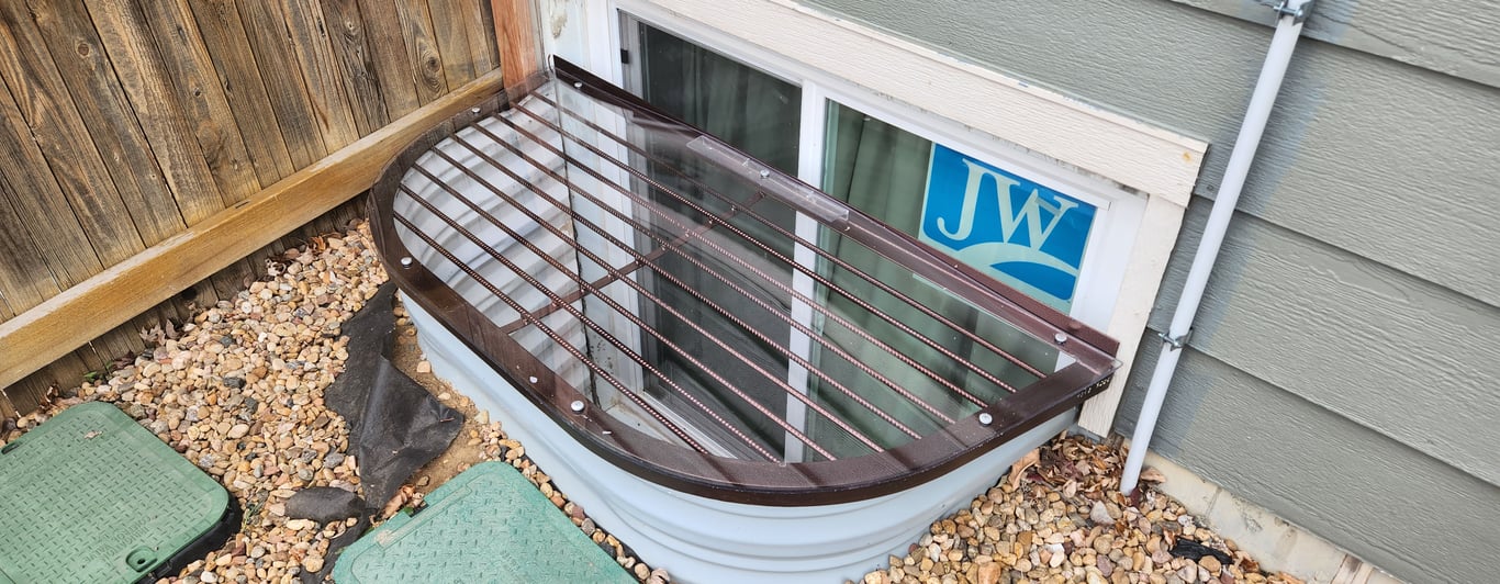 Overlay window well cover solution installed over existing metal grates in Glen Ellyn Illinois