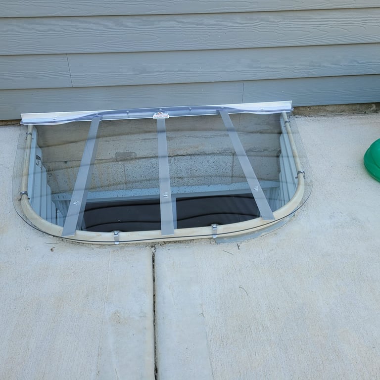 Window well cover in Aurora Illinois supporting up to 800 lbs installed by USA Window Well Covers