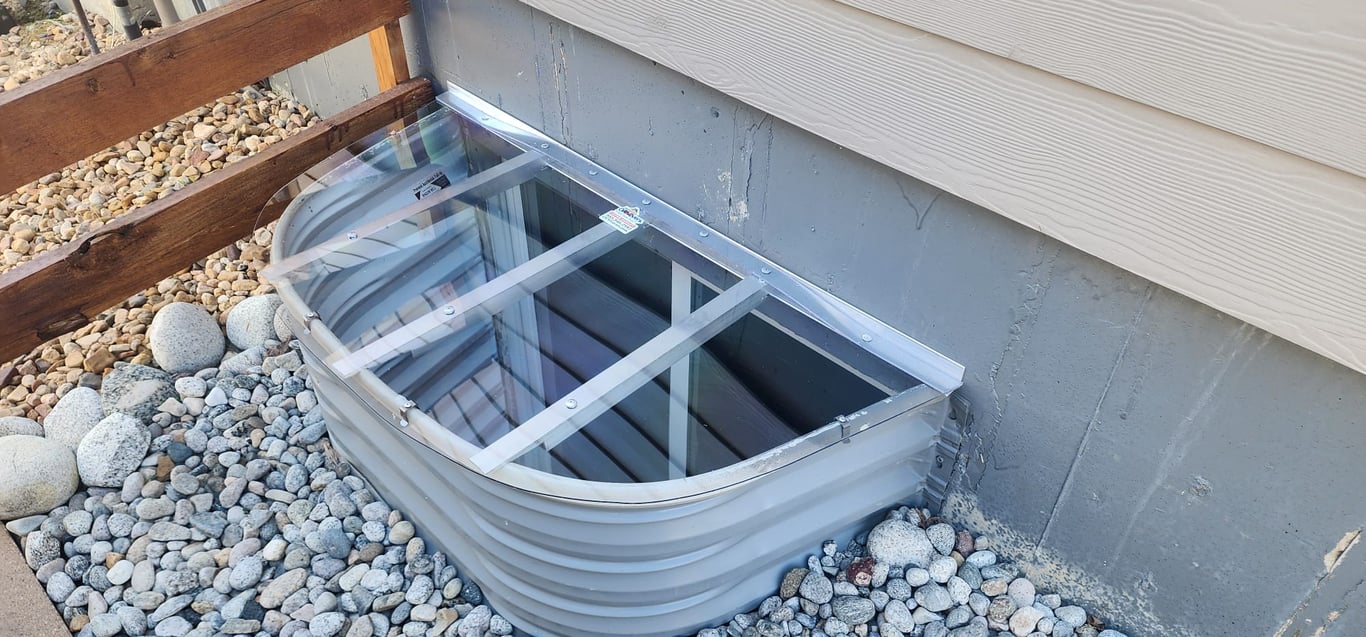 Window well replacement with clear polycarbonate cover installed near Lowell Indiana